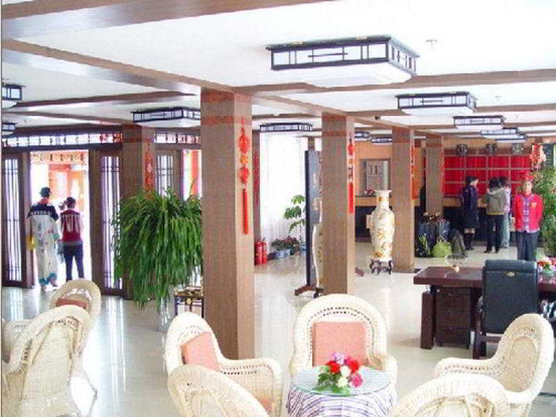 He XI Resort Hotel Лицзян Интерьер фото